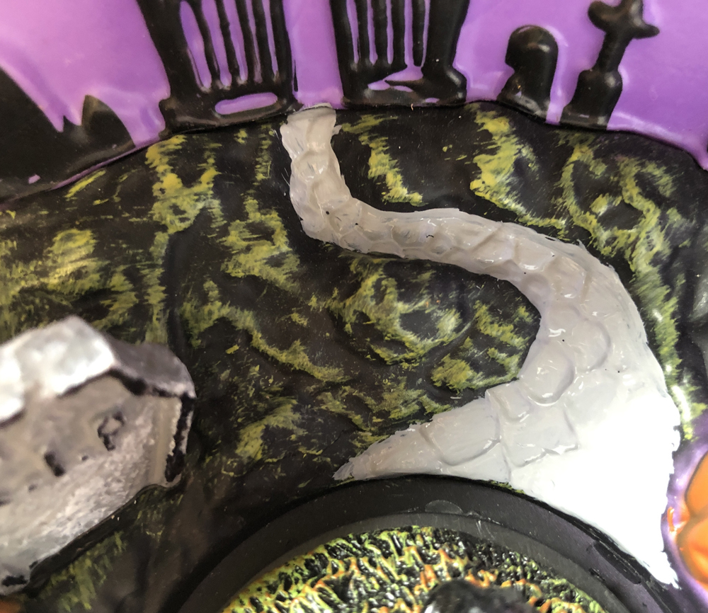 Halloween scene with gray road