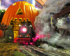 model train exiting model pumpkin on Halloween-themed layout