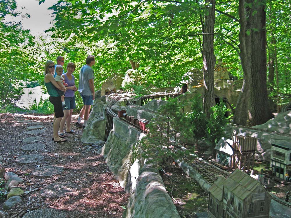 What my garden railroad taught me: group of people watching model trains