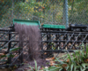 load of gravel being dumped on garden railway