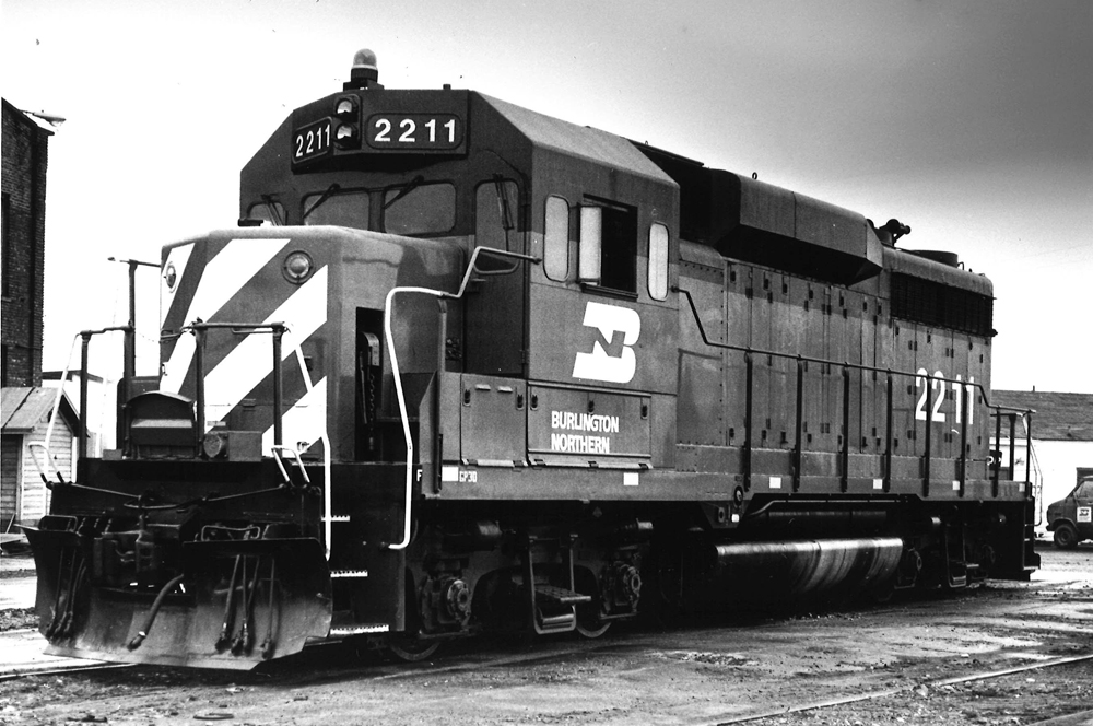 Black-and-white roster photo of four-axle road locomotive