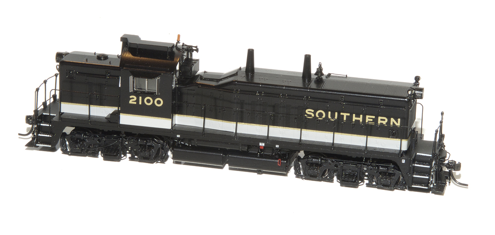 Photo of HO scale locomotive model in black, white, and gold paint