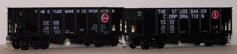 Two black coal hoppers