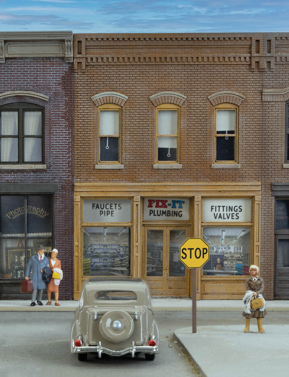 City street scene with yellow stop sign