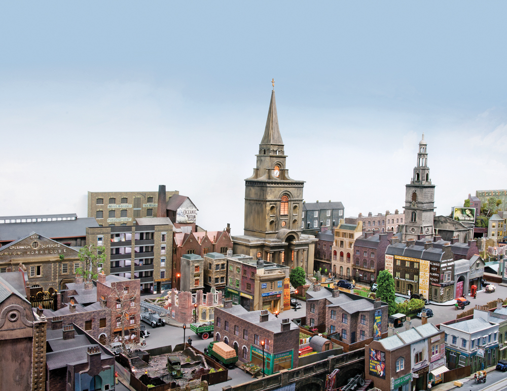 City scene with different churches and their tall steeples in view.