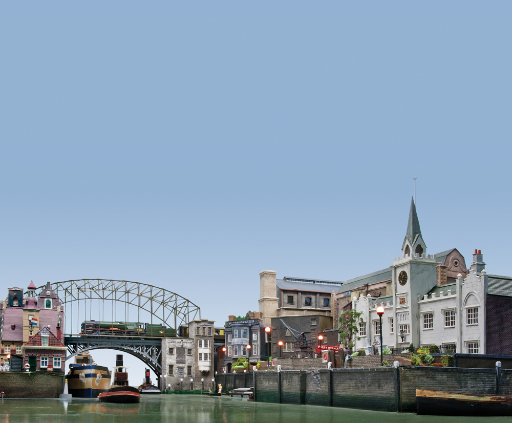 View of a large river and surrounding life on the banks.