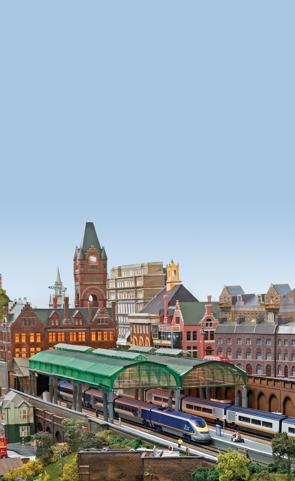 London skyline with train station in foreground.