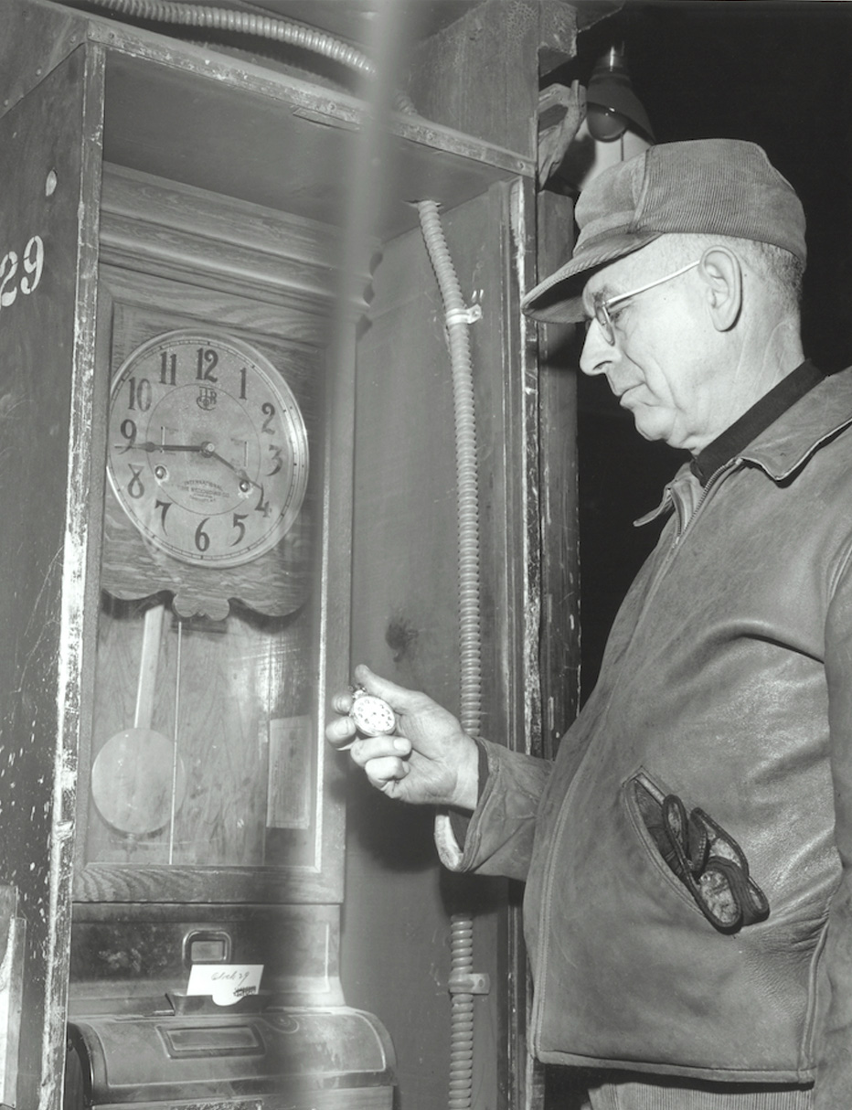 guy looking at watch and comparing dial