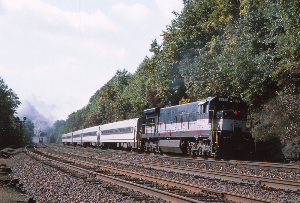 Locomotive with four passenger cars