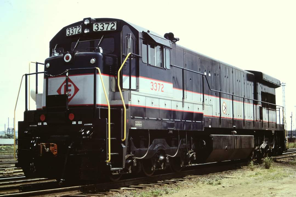 Black locomotive with gray stripe