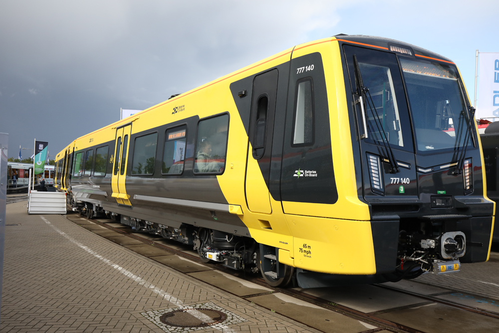 Yellow and gray multiple-unit passenger train