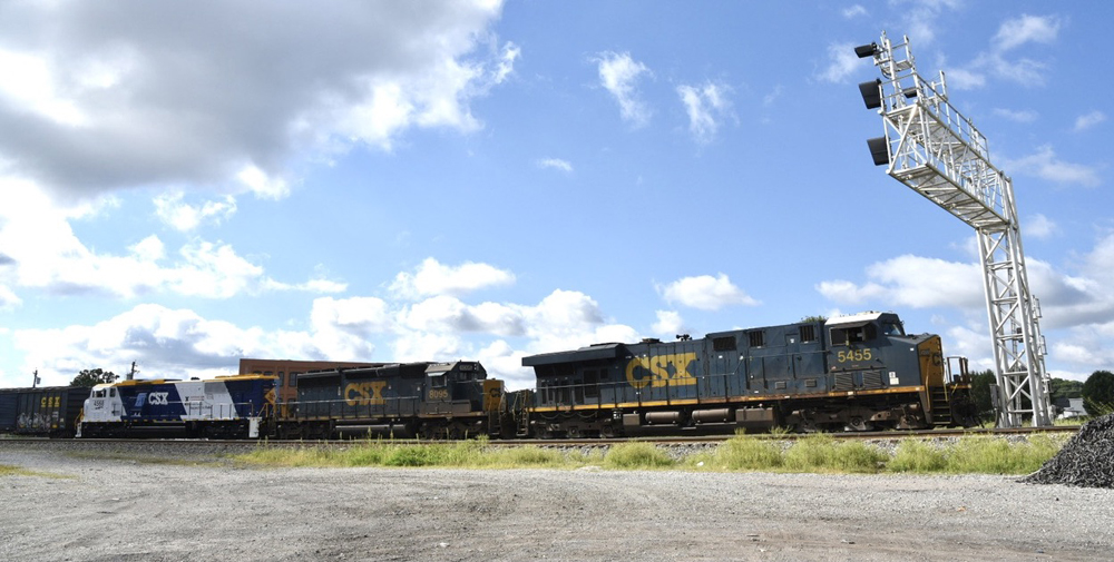 Three locomotives on freight train