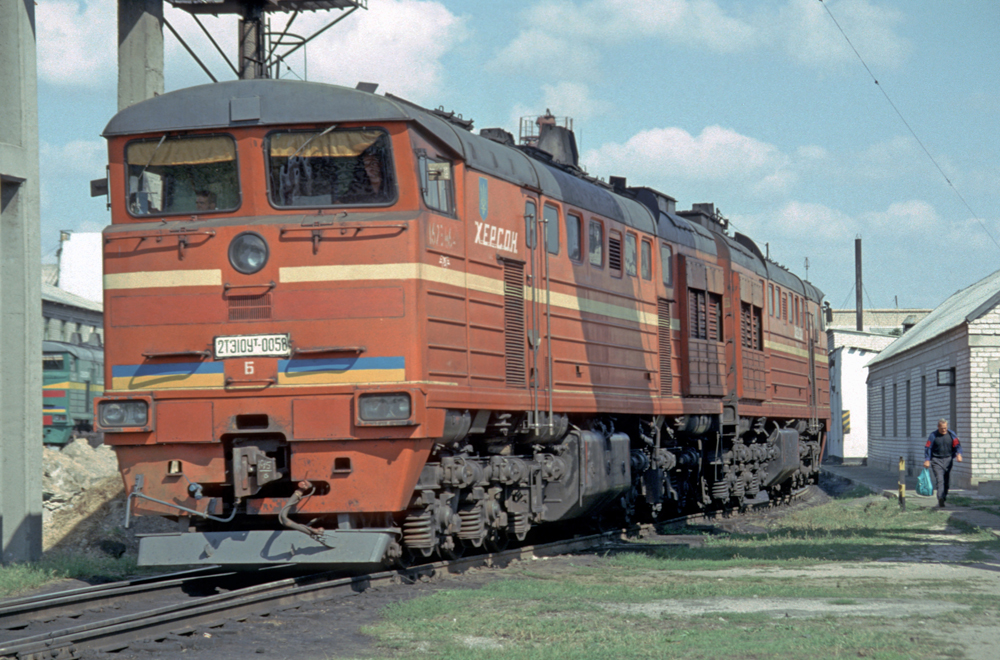 Large diesel locomotive at shop complex