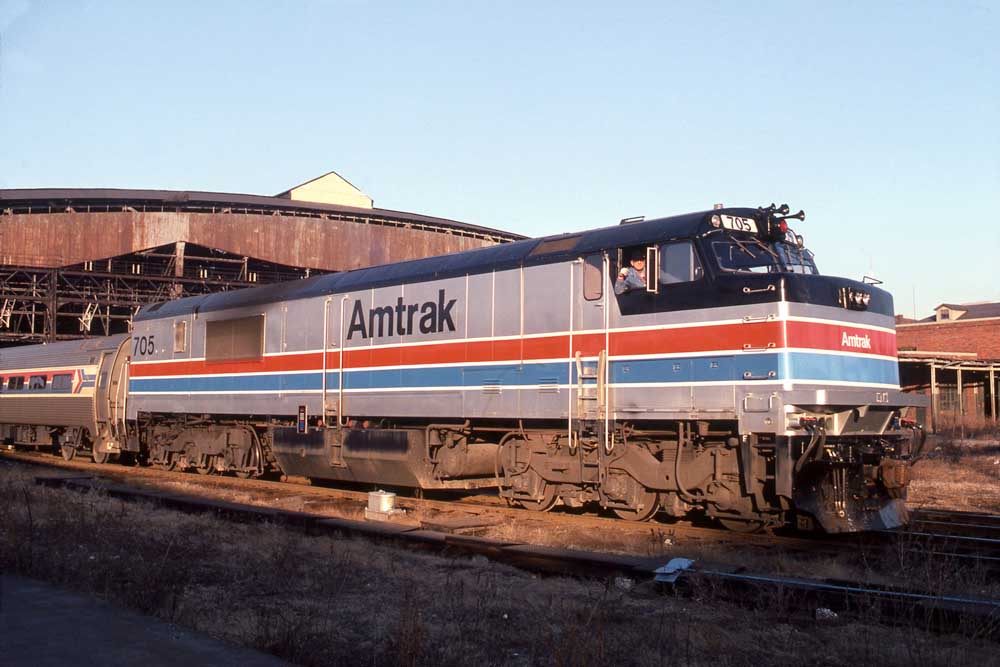 Amtrak St. Louis service train departing covered station