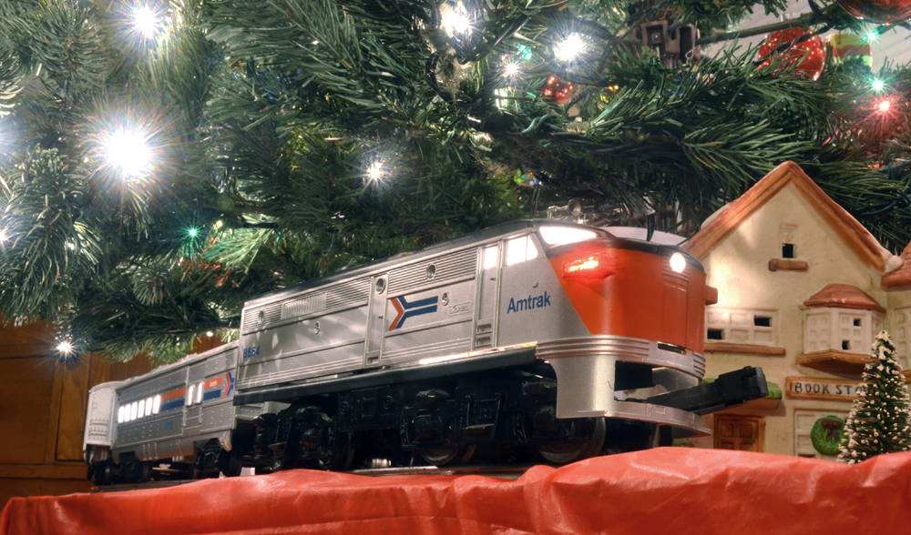 model train under Christmas tree