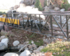 mainline railroading in the 1950s: model steam locomotive on bridge