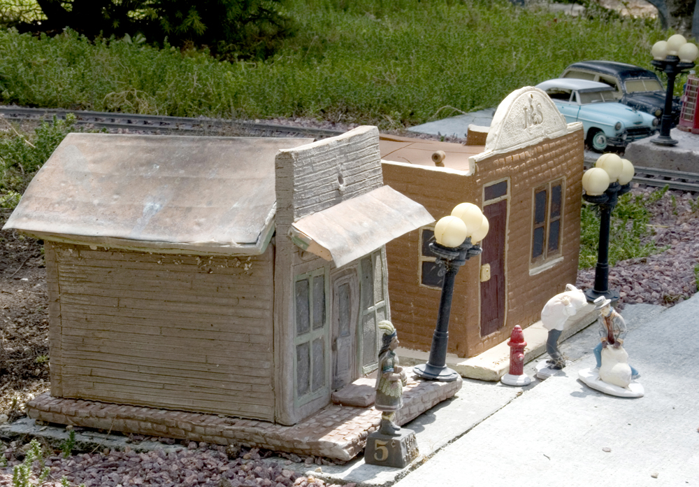  two model buildings on garden railway