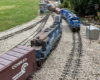 two blue diesels on a garden railway