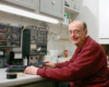 Photo of man at workbench