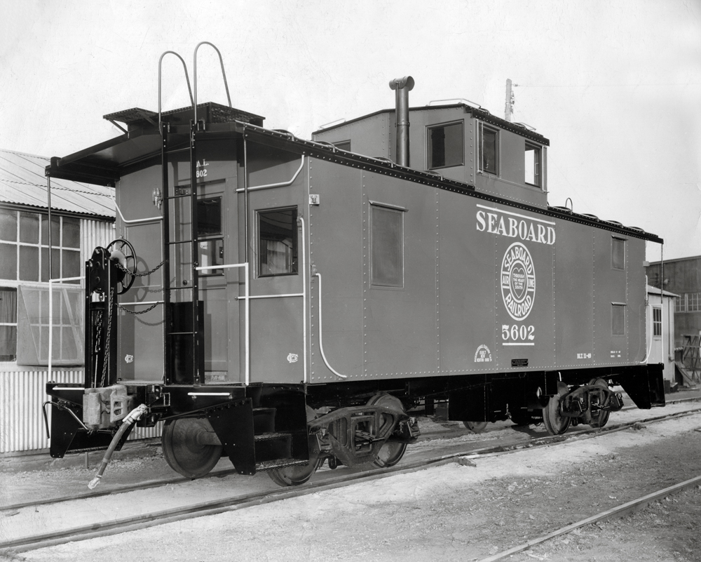 Black-and-white photo of standard-cupola caboose