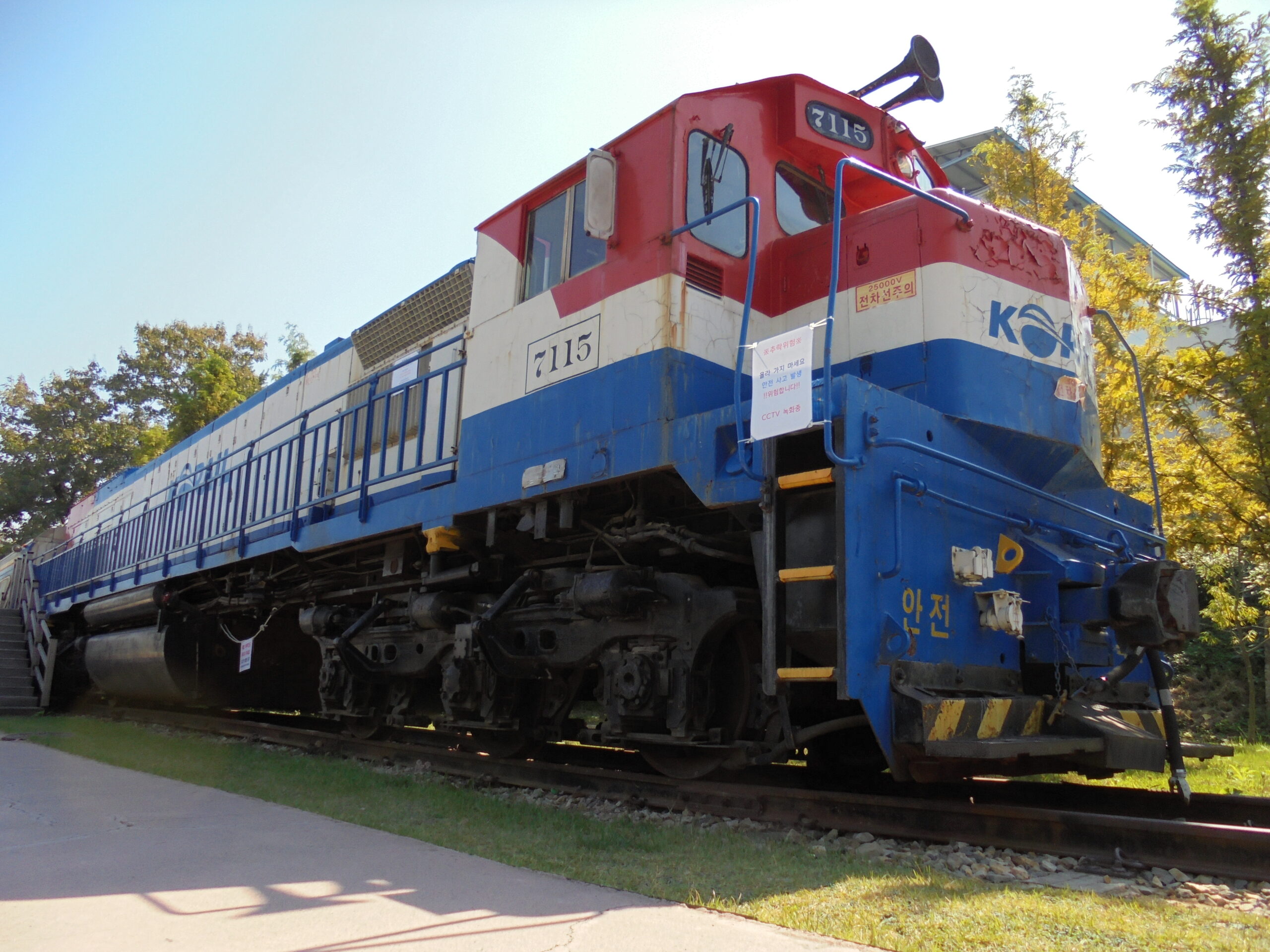 red, white, and blue locomotive relic