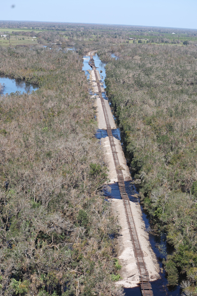 Aerial view of railroad line with several washouts
