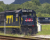 blue with yellow lettering on locomotive