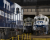 three locomotives parked