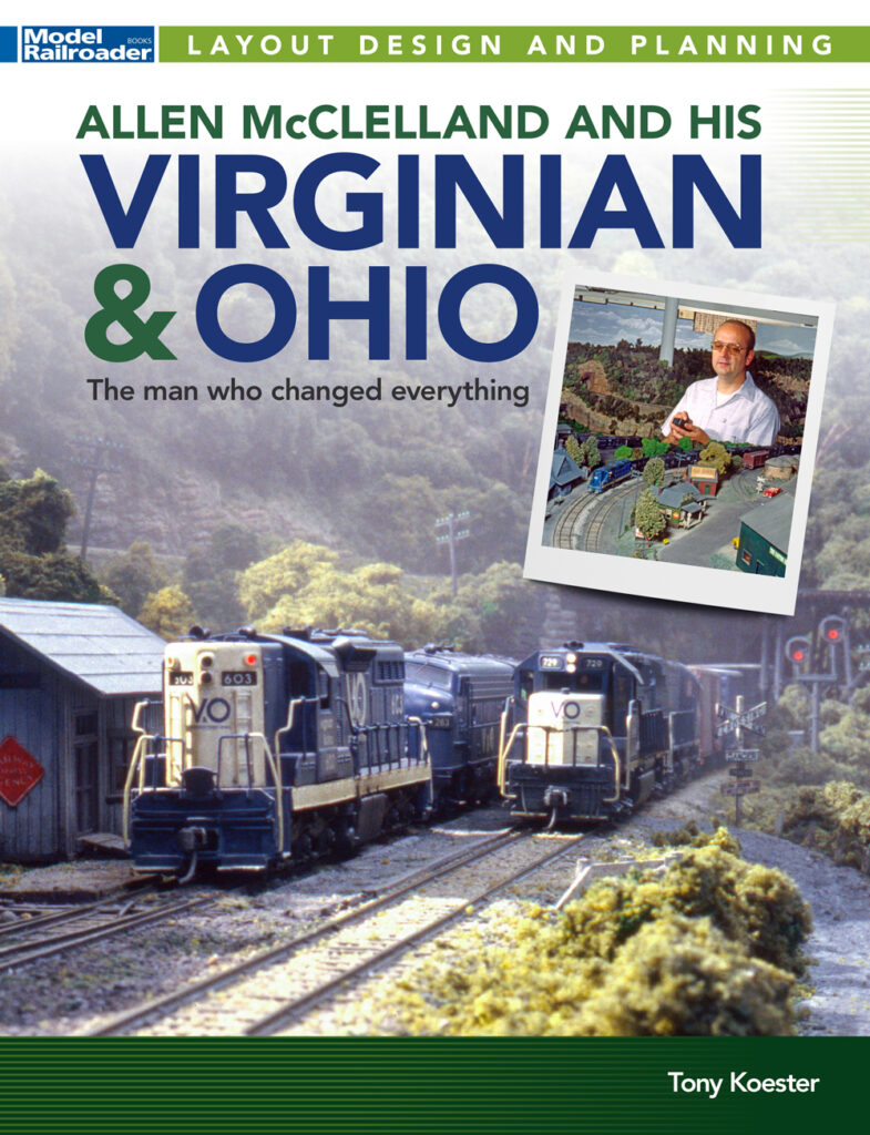 Cover of book with two trains on HO scale layout and man operating trains