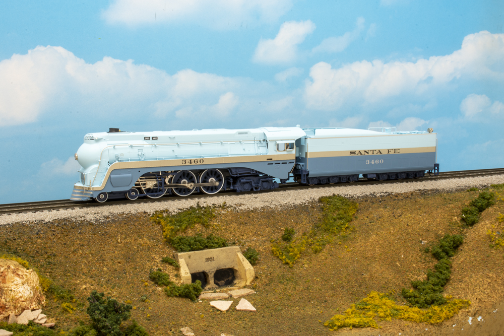 a light blue model steam locomotive