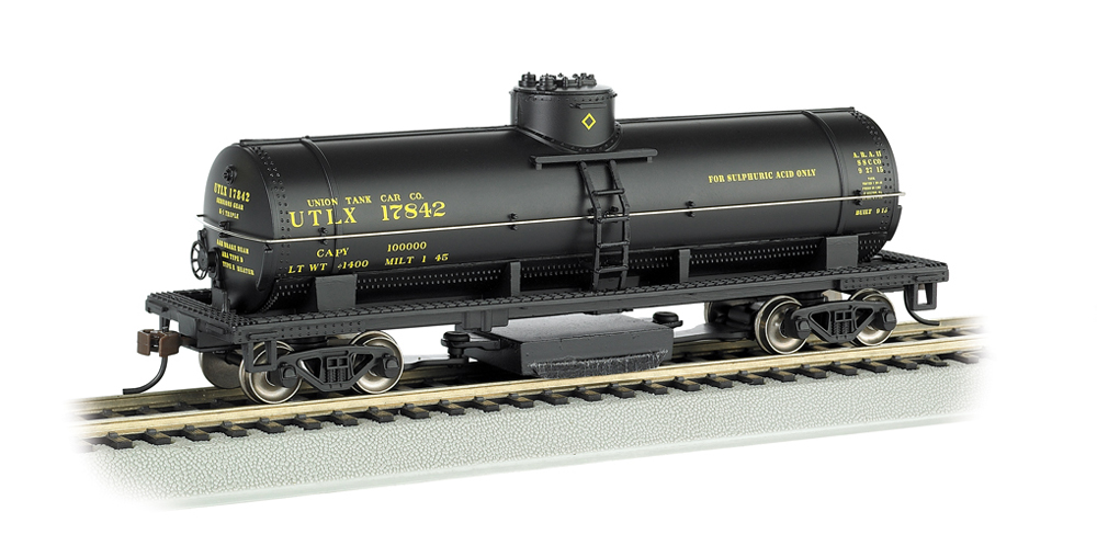 Photo of HO scale tank car with cleaning pad attached.