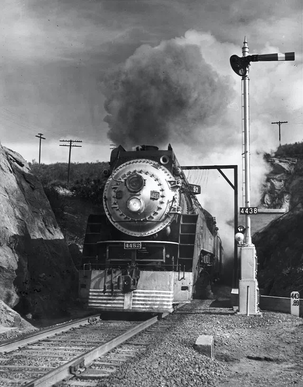 train emerging from tunnel
