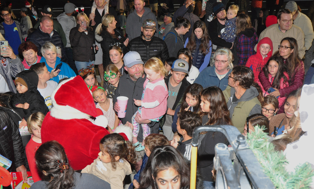 crowd of people with Santa