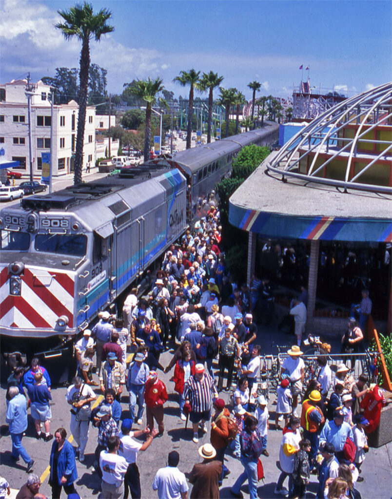 color photo of train with crowd