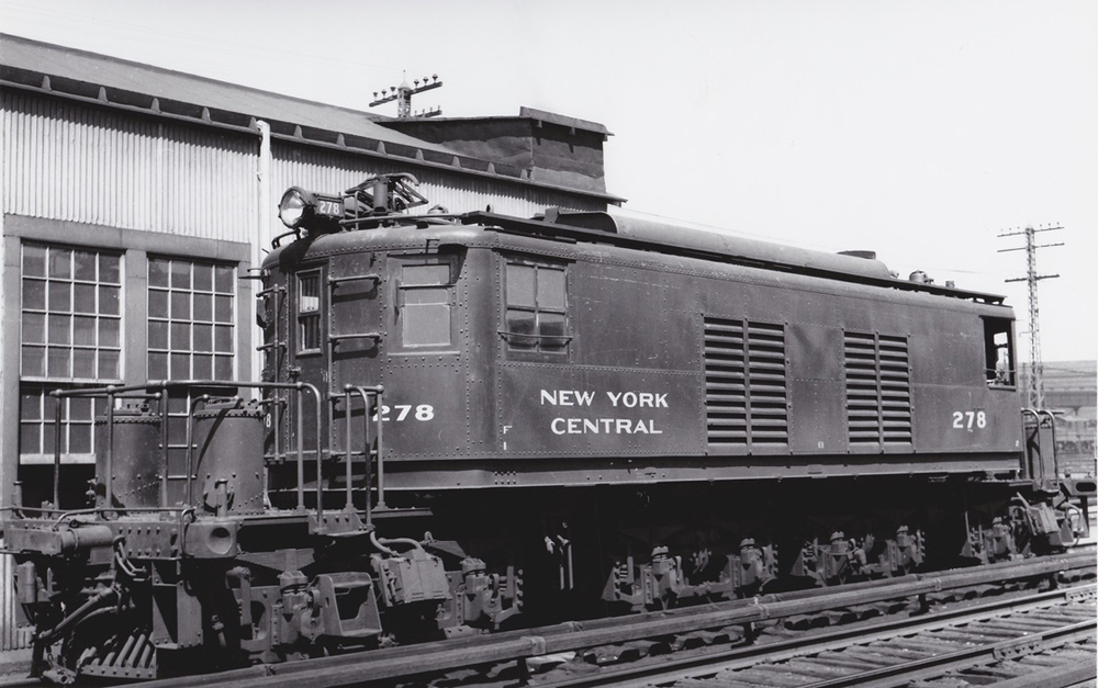 Black and white photo of a boxcab style electric locomotive