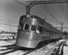 Streamlined Chicago North Shore & Milwaukee equipment under catenary