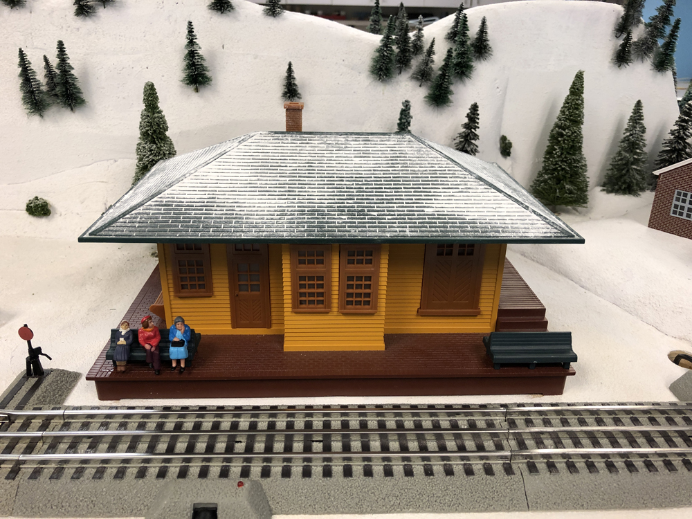 toy train layout scene with station