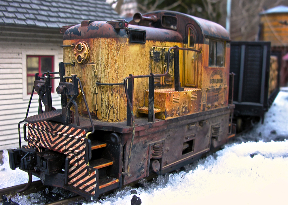 close up of rusty model diesel on track