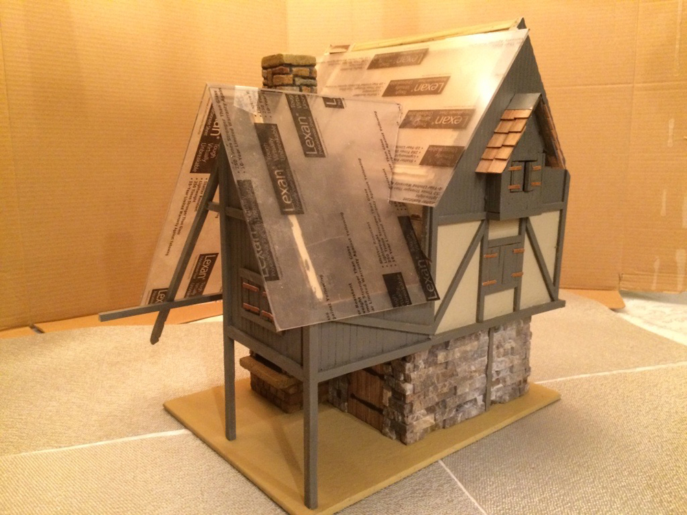 attaching roofs on model cottage