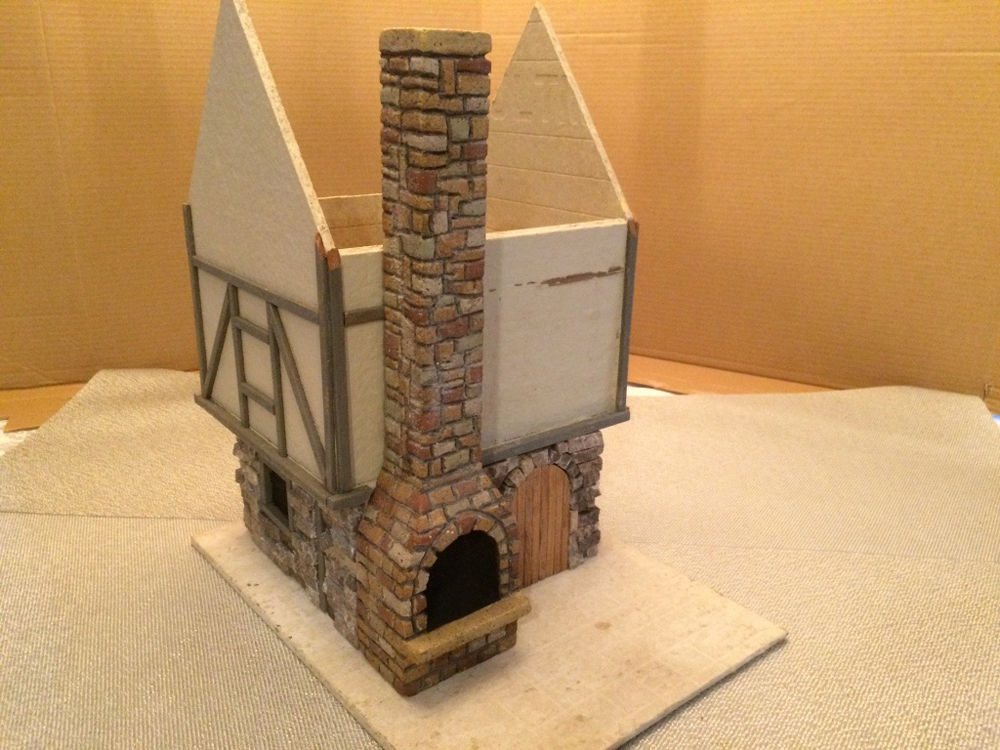 model chimney attached to cottage