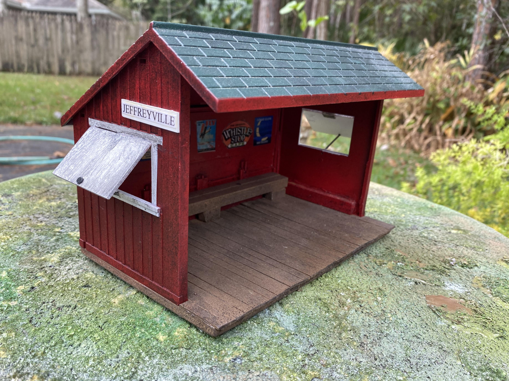 red and green model station on a table