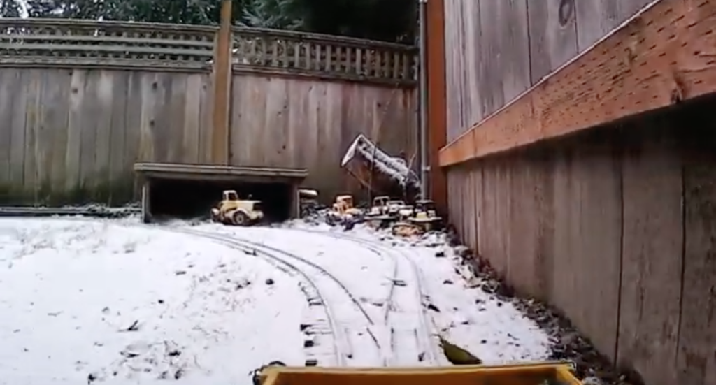 snowy scene on garden railway