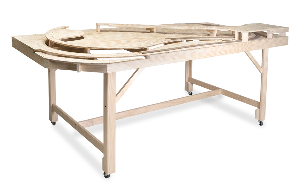 A 4 x 8-foot table with plywood terrain at different heights, on a white background