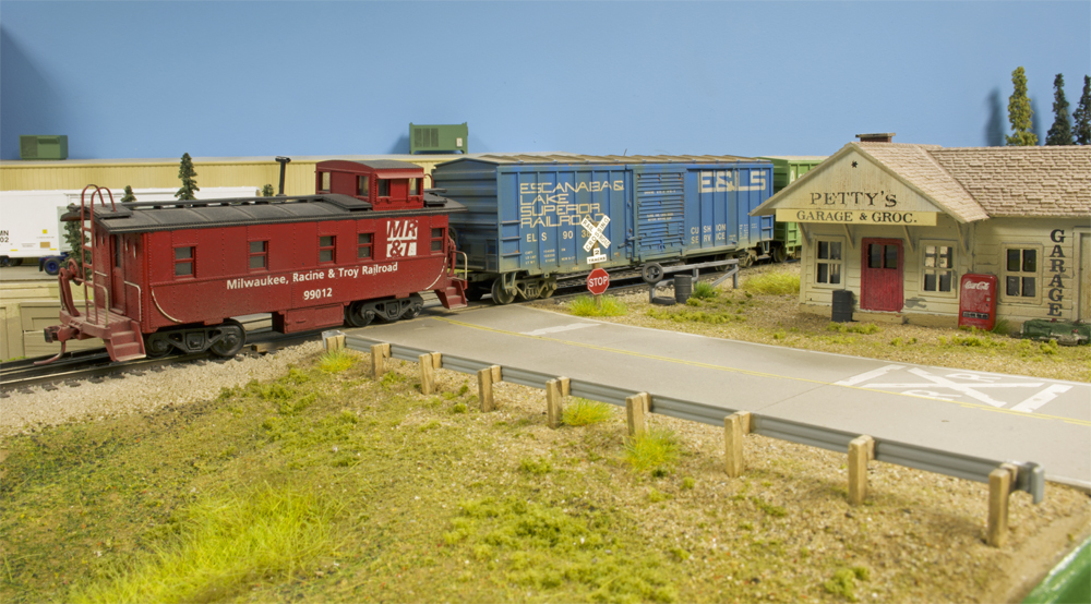Photo of derailed caboose.