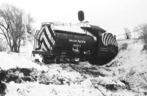 Derailed Union Pacific wedge plow