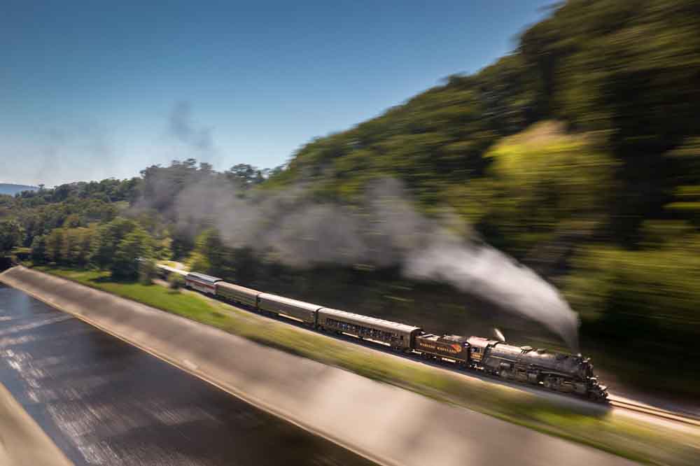 train moving fast on rails