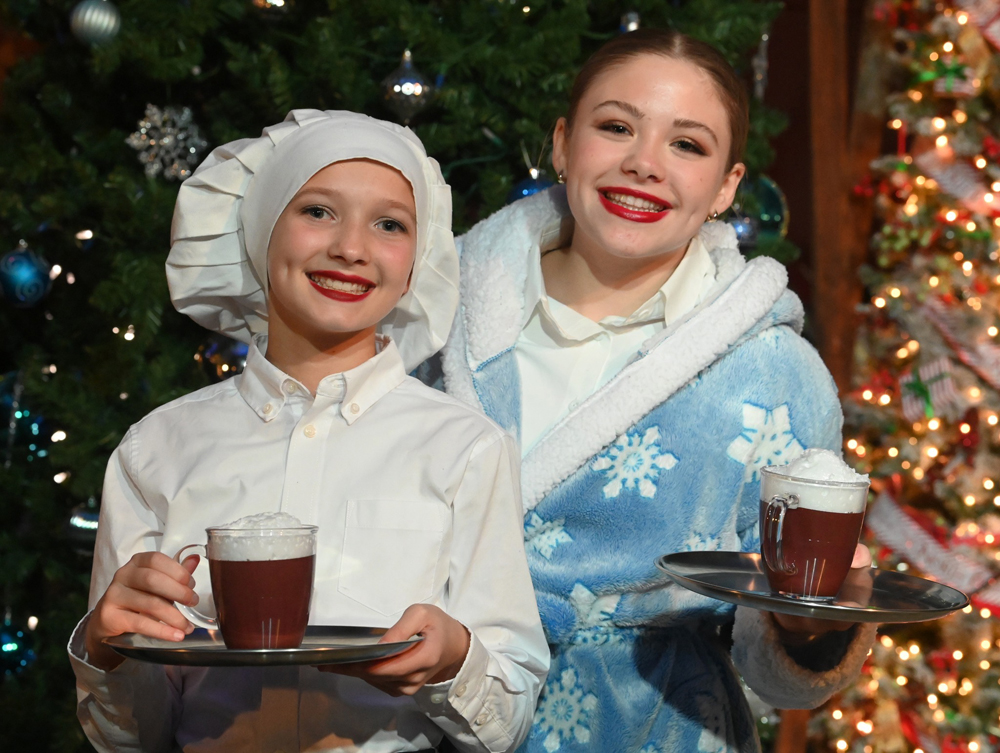 two girls with hot chocolate