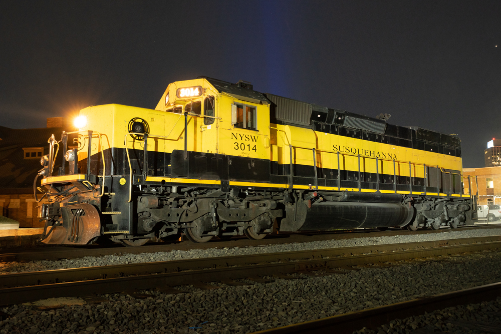Yellow and black locomotive