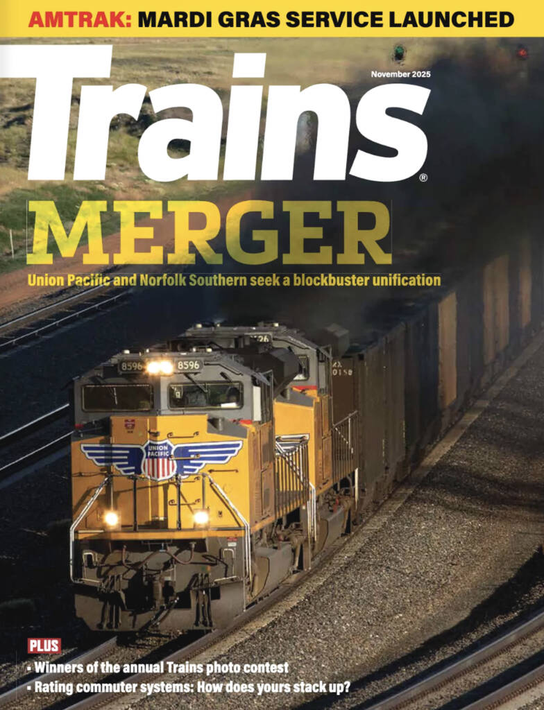 The November 2025 cover of Trains magazine which features a Union Pacific advancing towards the camera with large text which reads "MERGER"