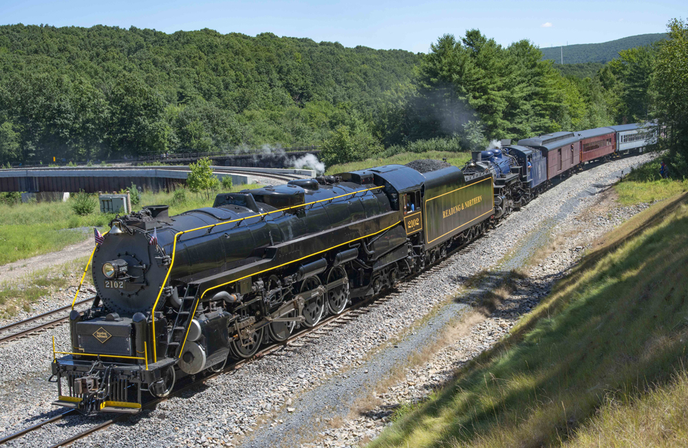 Passenger train with two steam locomotives